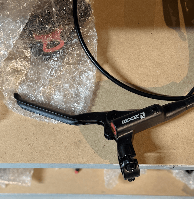 Remhendel van hydraulische rem met remoliereservoir